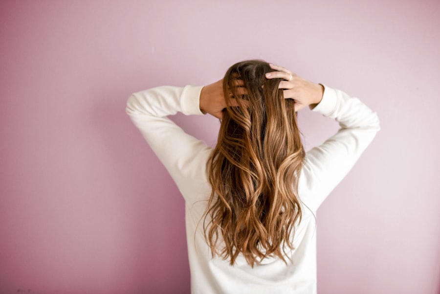 Woman with soft, styled hair, representing salon hair services